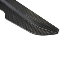 Close-up of Corvette C8 carbon fiber side skirt showing weave pattern and surface finish
