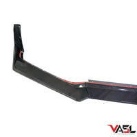 Close-up studio render of VASL carbon fiber front splitter on Corvette C8 Z06, showing precise 5-piece assembly and weave details