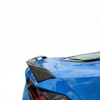 Detailed view of the 5-piece carbon fiber rear spoiler on Corvette C8 Z51, showing aerodynamic design and mounting points