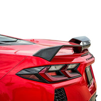 Detailed view of the 5-piece carbon fiber rear spoiler on Corvette C8 Z51, showing aerodynamic design and mounting points