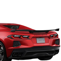 Rear three-quarter view of Corvette C8 Z51 with carbon fiber spoiler, highlighting aggressive stance and integration
