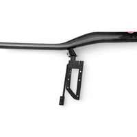 Detailed close-up of VASL carbon fiber rear spoiler on Corvette C8 Z06, showing 3D weave texture and mounting points