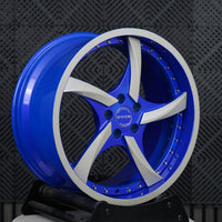 VP08 2024 Ford Mustang GT Premium Performance Pack Big Brakes custom aftermarket 5-spoke directional rims with blue barrel silver trim and chrome hardware by VASL Performance